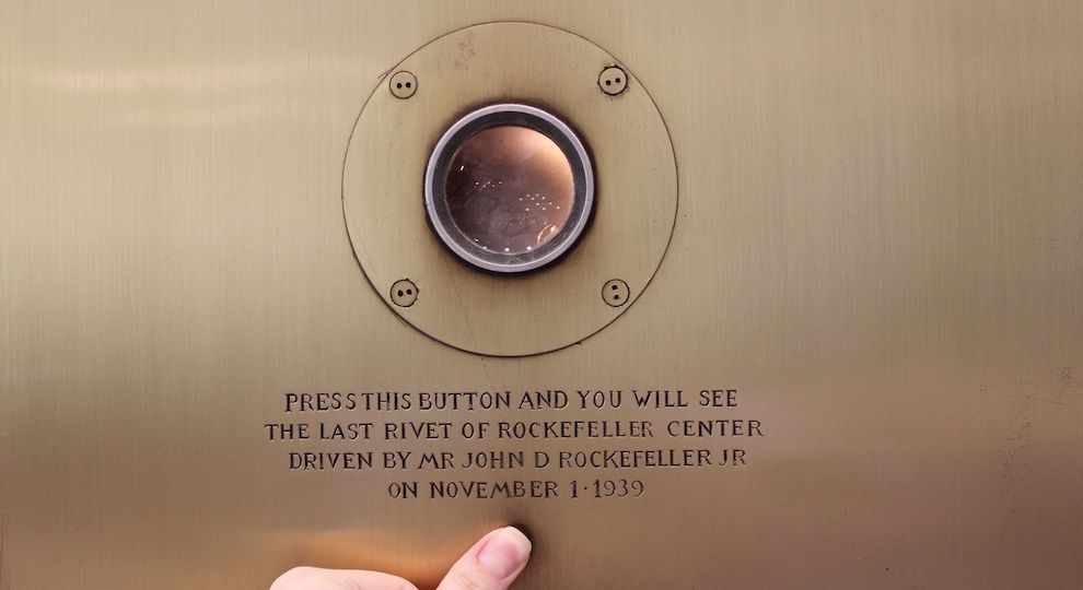 The last rivet of Rockefeller Center driven in by John D. Rockefeller in 1939