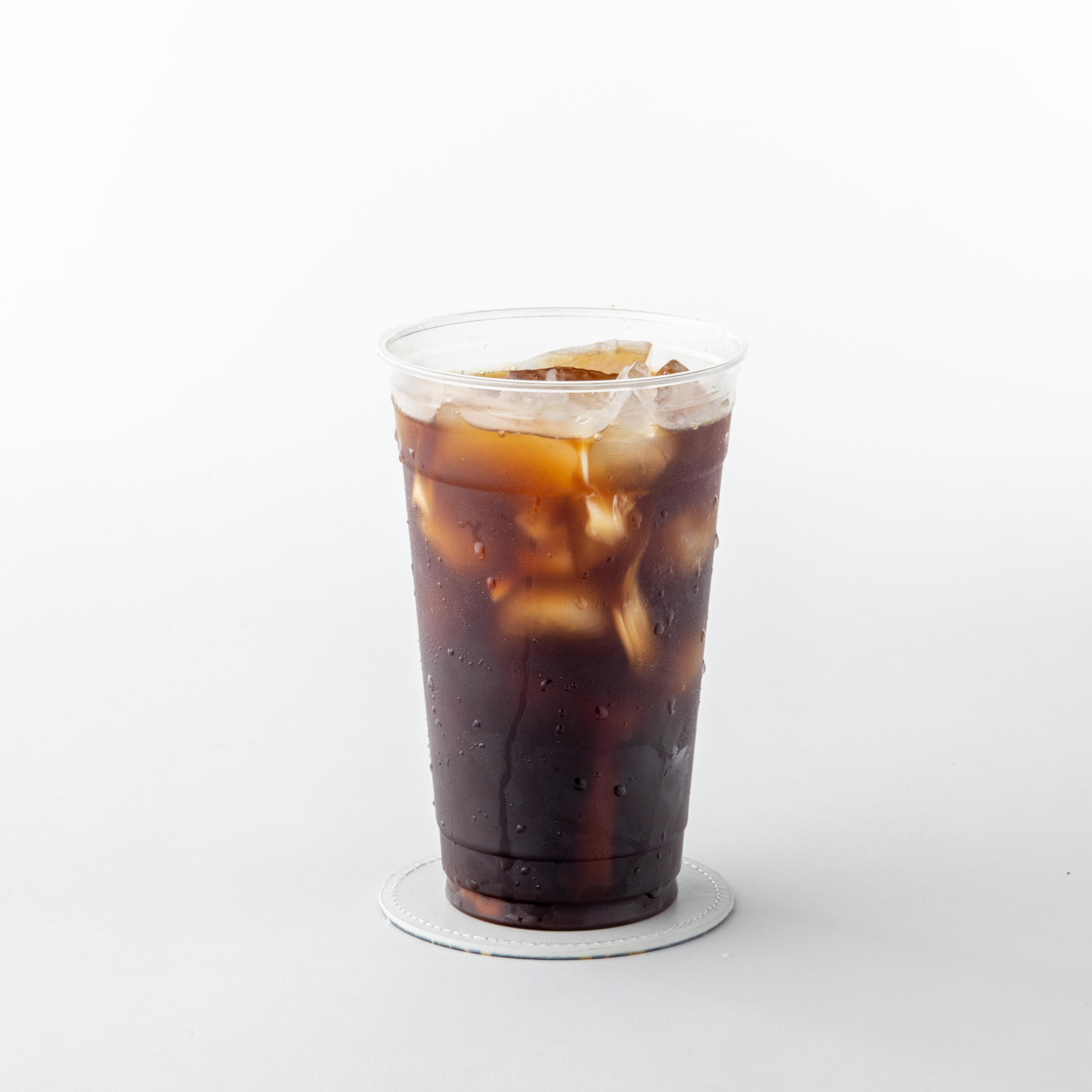 A plastic cup filled with iced coffee from Magnolia Bakery at Rockefeller Center