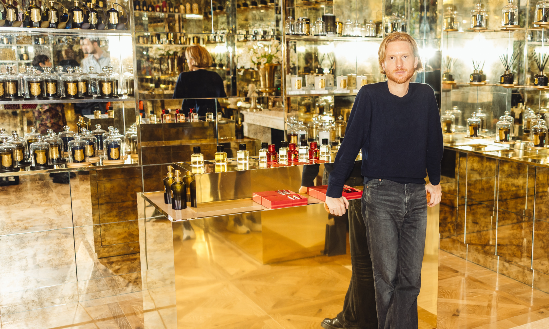 Creative Director Hugo Ferroux stands inside Trudon's new store at Rockefeller Center