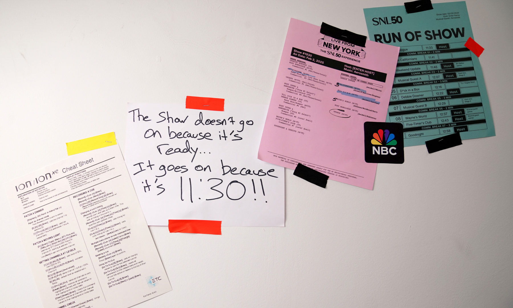 Various papers and signage at the 'Live from New York: The SNL50 Experience'
