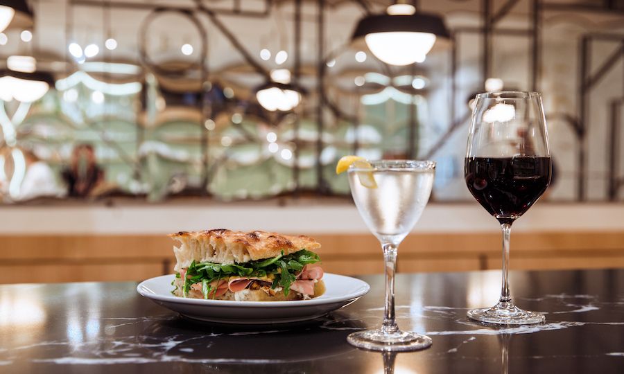 Sandwich, cocktail, and wine from 21 Greenpoint at Rockefeller Center