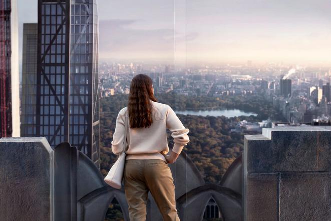 Woman overlooking skyline