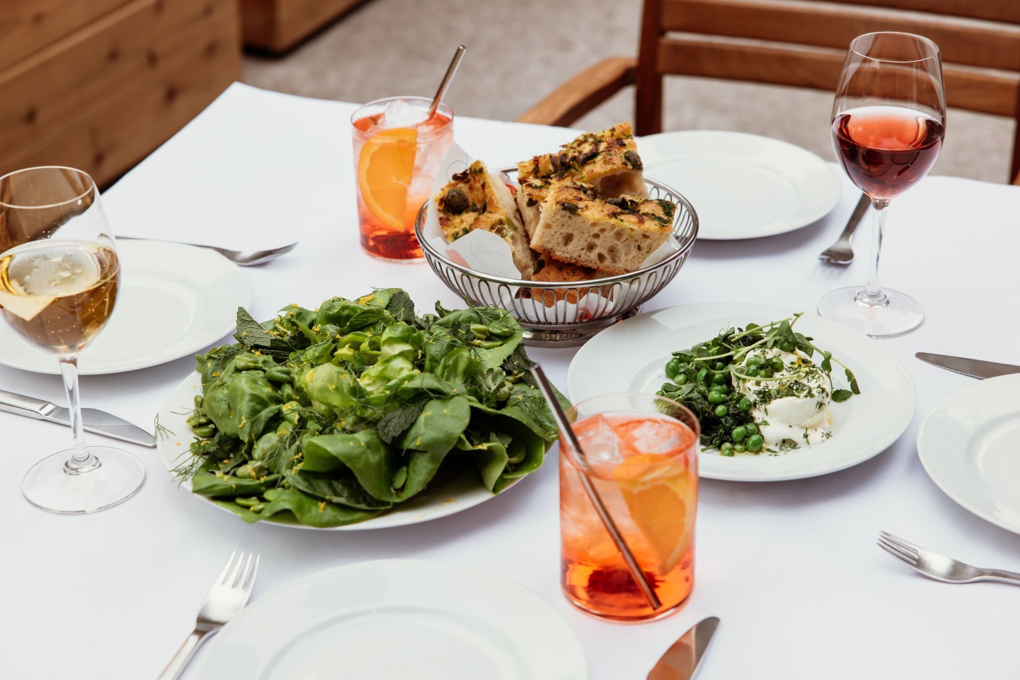 table with food on outdoor patio at Rockefeller Center