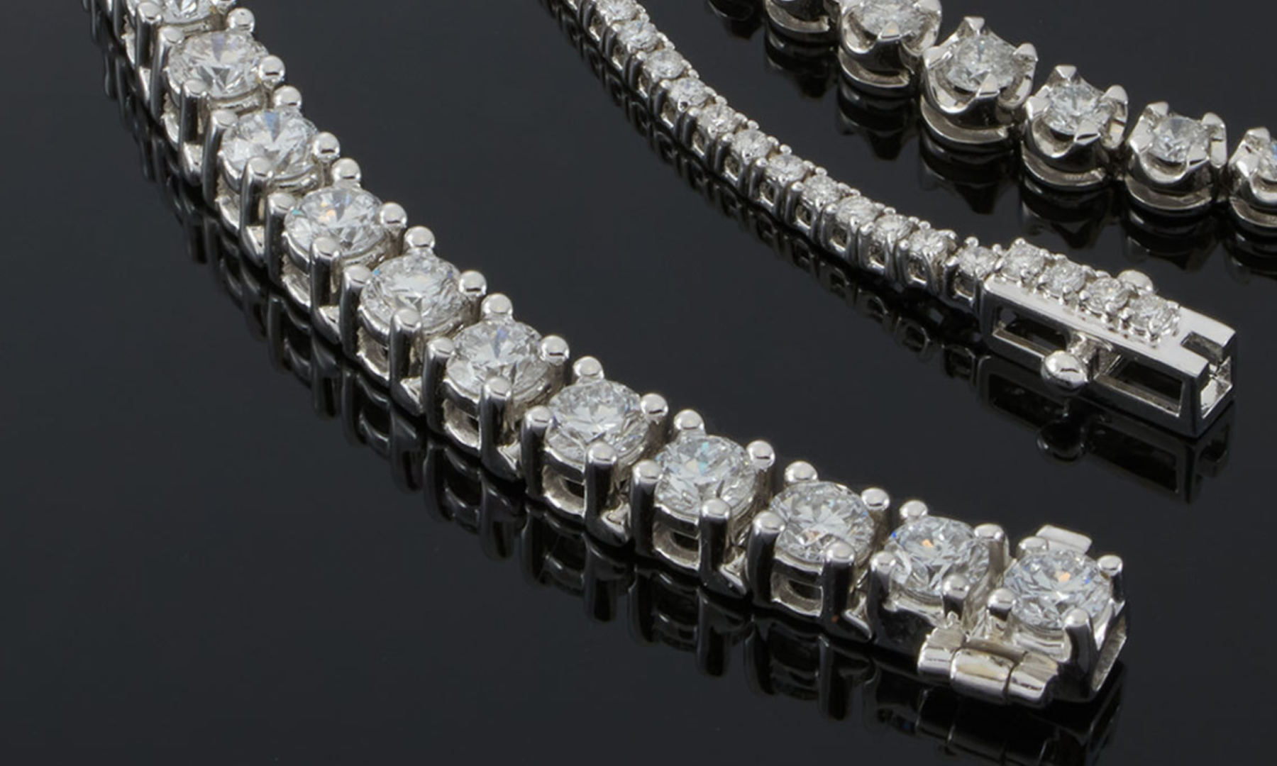 A closeup of the three tennis bracelets from Louis Martin Jewelers
