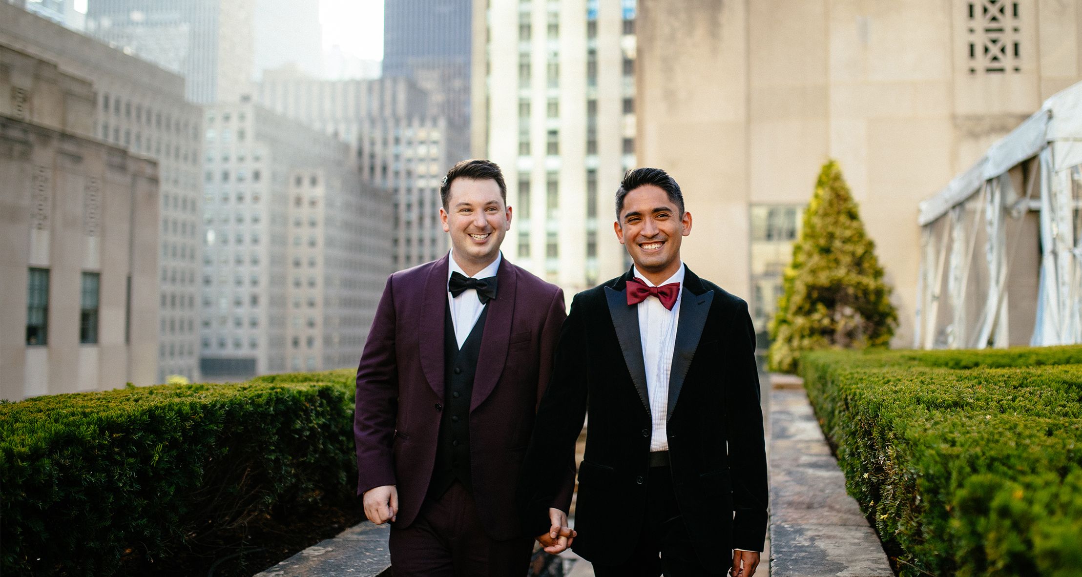 Cole and Marco holding hands on their wedding day
