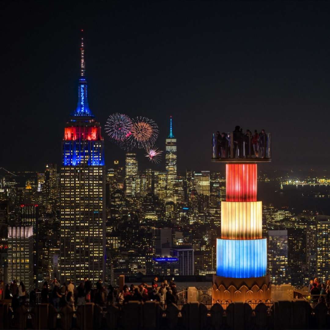 Rendering of people watching NYC's 4th of July fireworks show from Top of the Rock