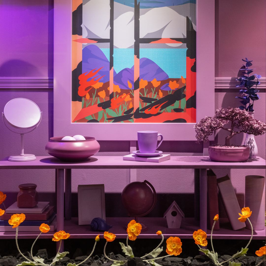 A vitrine of artwork by Greg Ito on display at Rockefeller Center