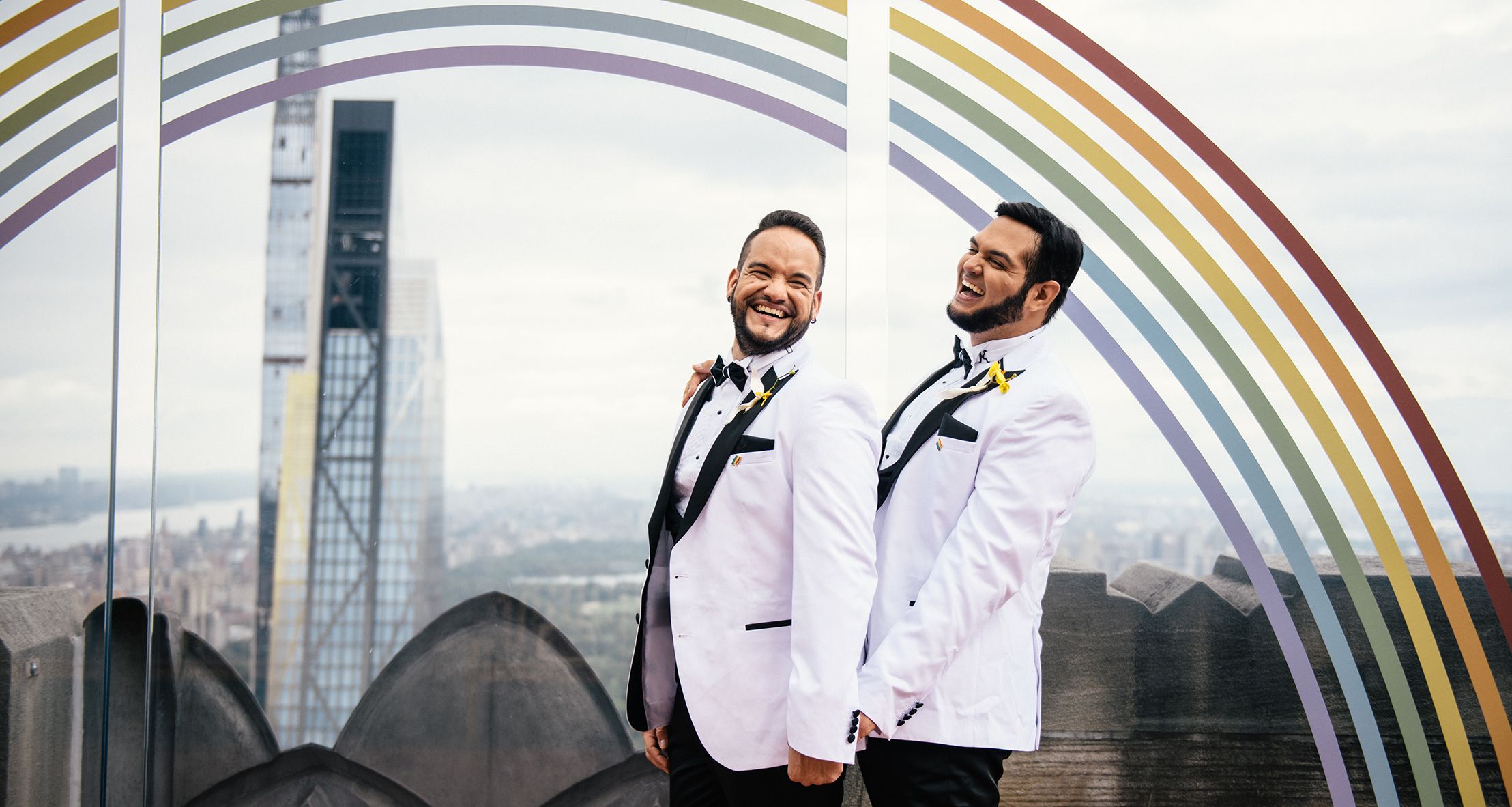 Couple laughing on the Top of the Rock