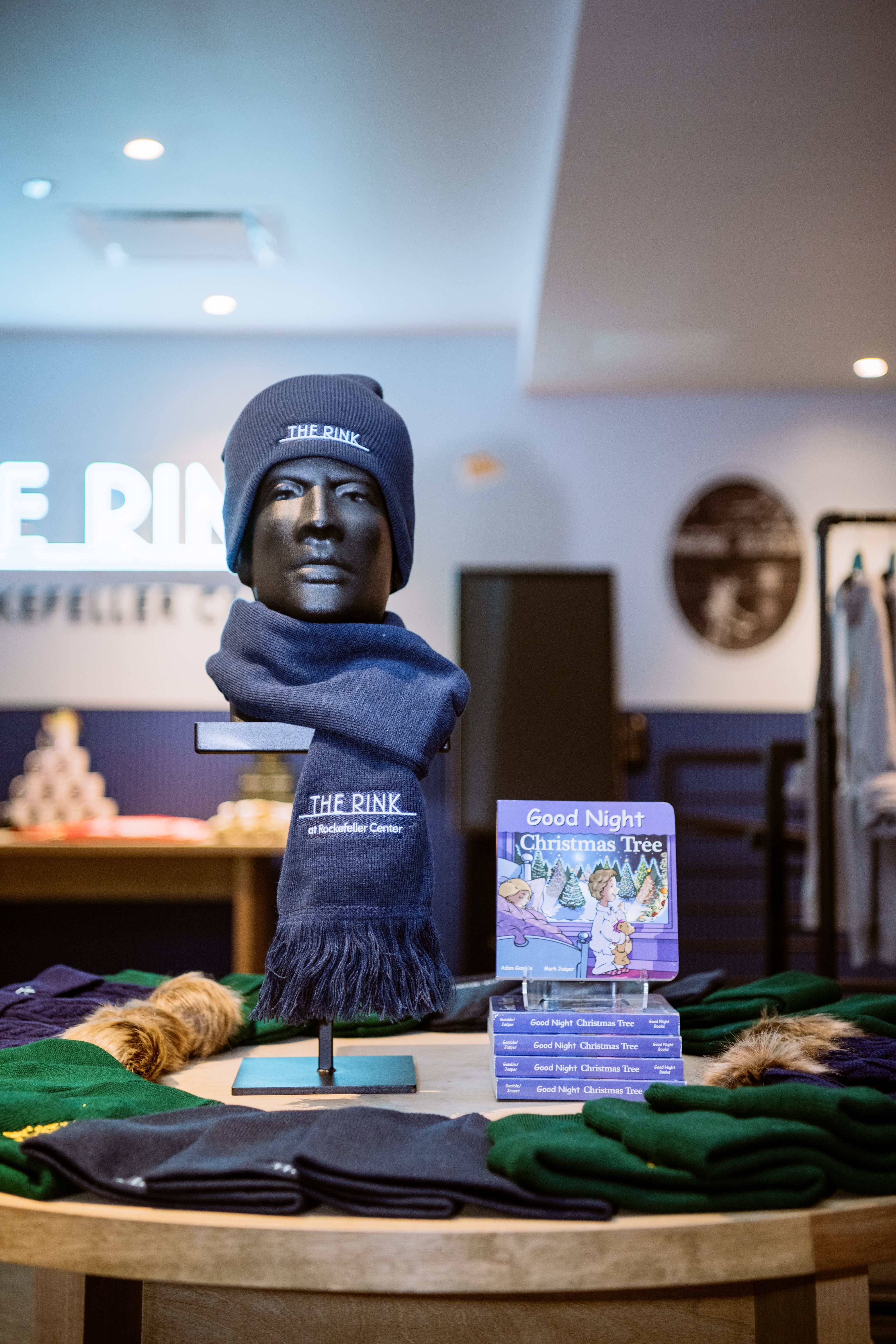 Merchandise set up on a table in the rink store