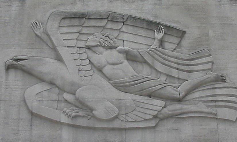 Morning, Present, Evening, a carving by Robert Garrison on display above the entrance to 1270 Avenue of the Americas.