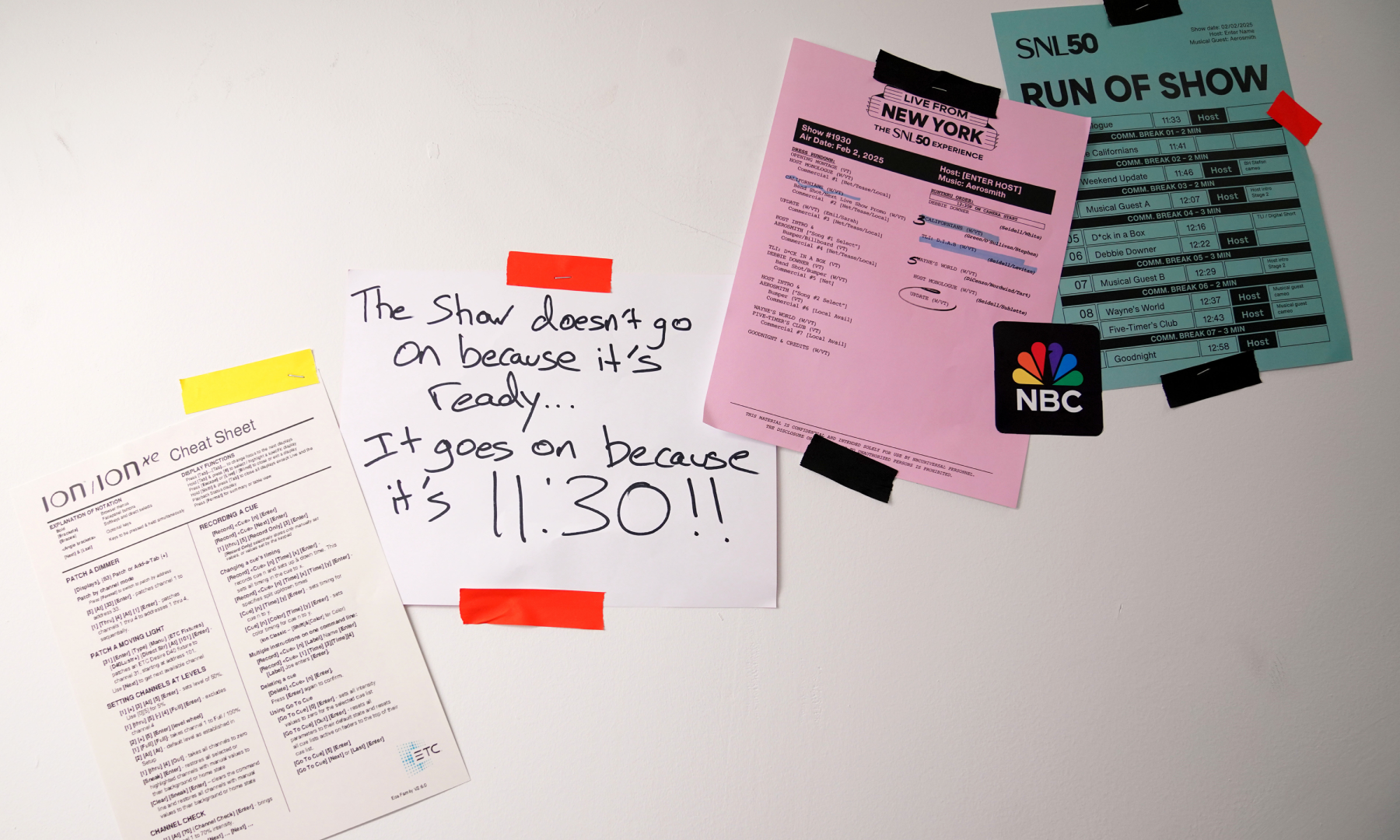 Various flyers on display at the SNL50 Anniversary Experience