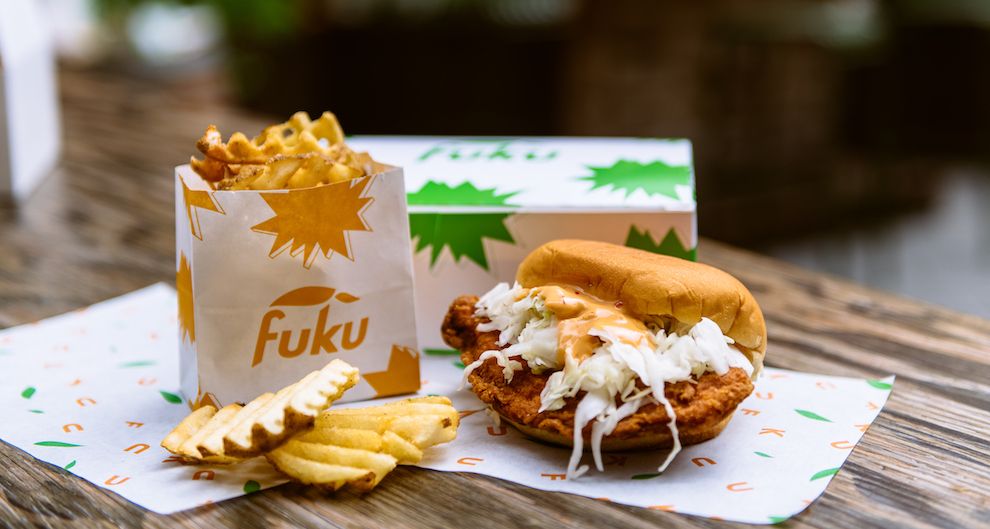 Fuku chicken sandwich and fries on a table