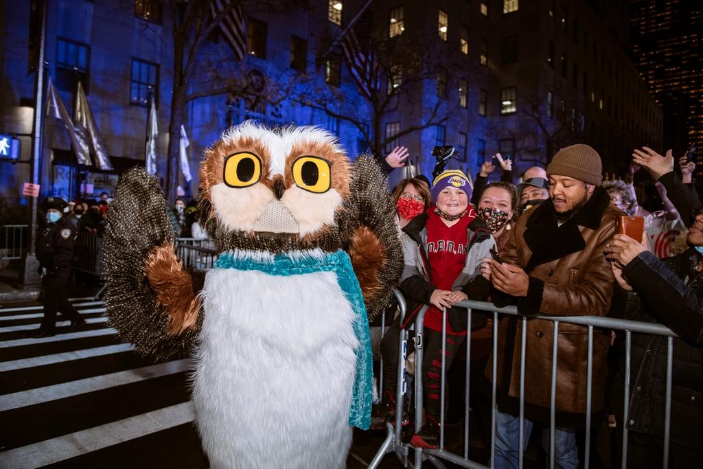 Roxy the Owl poses with visitors at the 2021 Rockefeller Center Tree Lighting