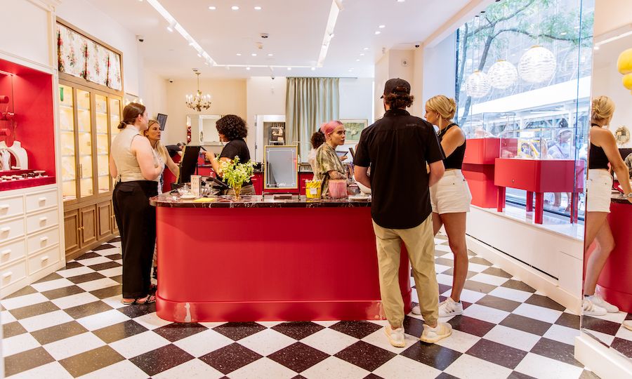 Customers and employees inside the new Catbird store at Rockefeller Center
