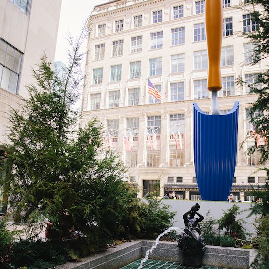 Rear view of 'Plantoir, Blue' by Claes Oldenburg and Coosje van Bruggen in the Channel Gardens at Rockefeller Center