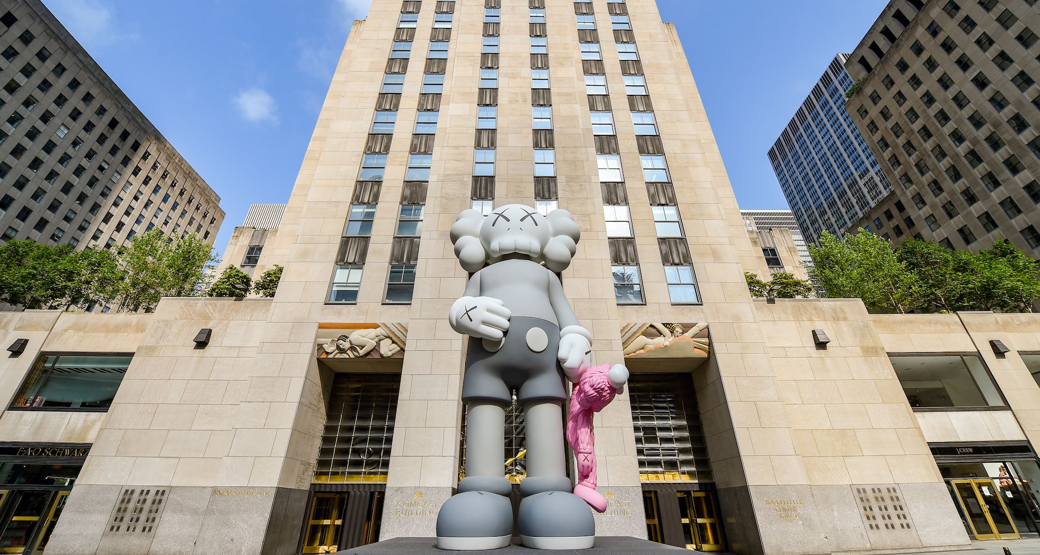 SHARE, an 18-foot-tall sculpture by KAWS