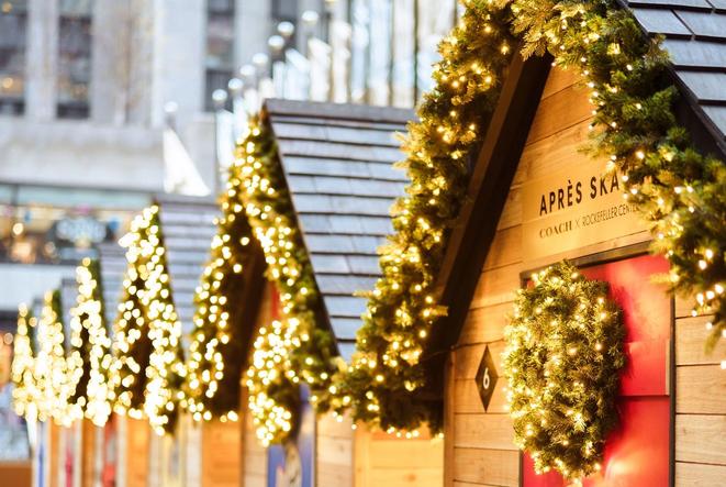 Rink-side chalet cabins decorated for the holidays