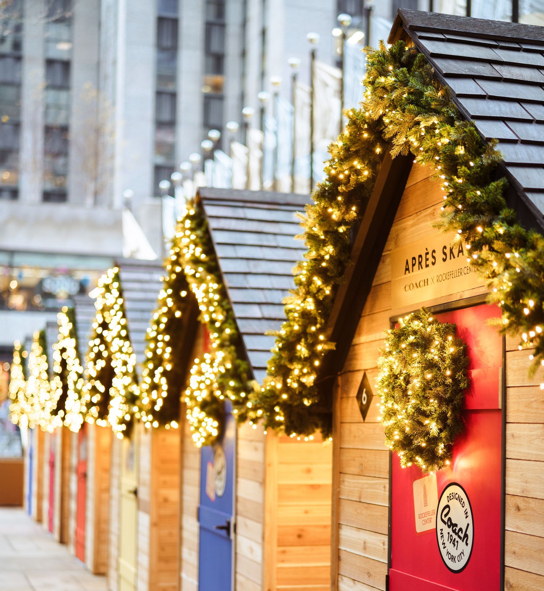 Rink-side chalet cabins decorated for the holidays