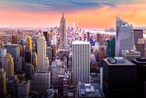 Sunlight hitting the skyscrapers of Manhattan at sunset.