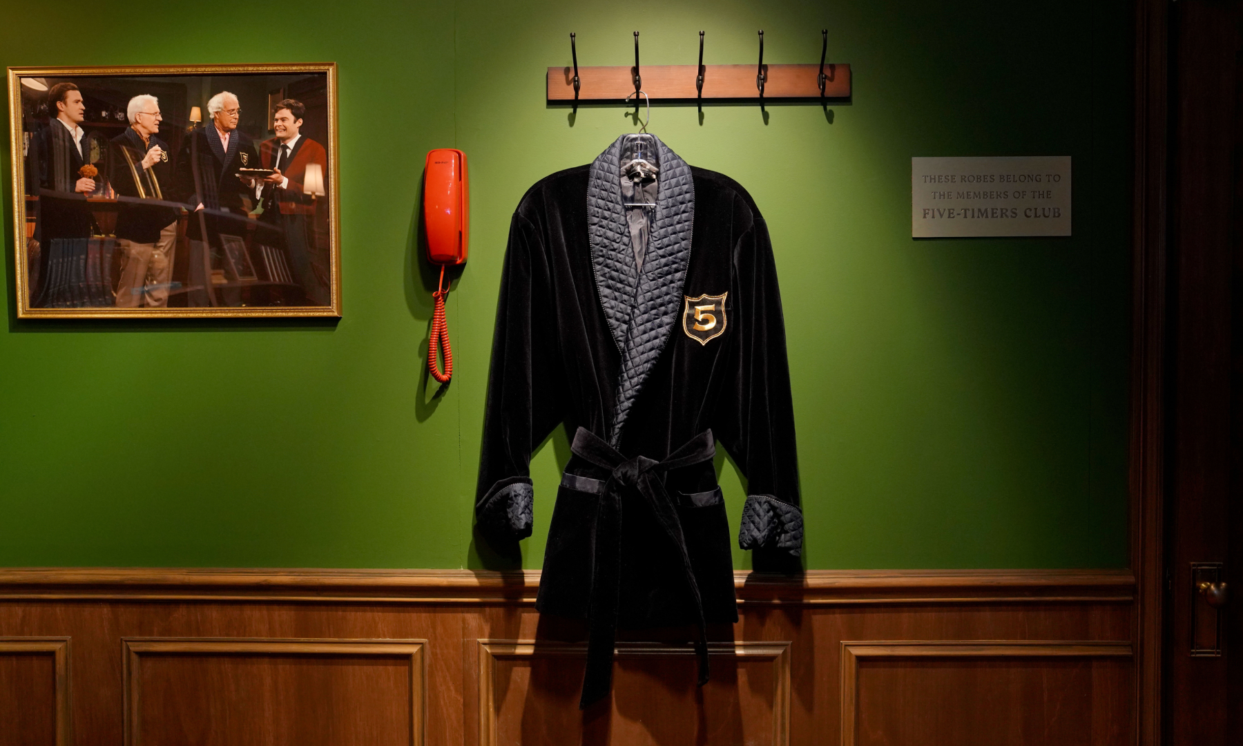 Saturday Night Live's Five-Timers robe hanging on a wall at the 'Live from New York: The SNL50 Experience'
