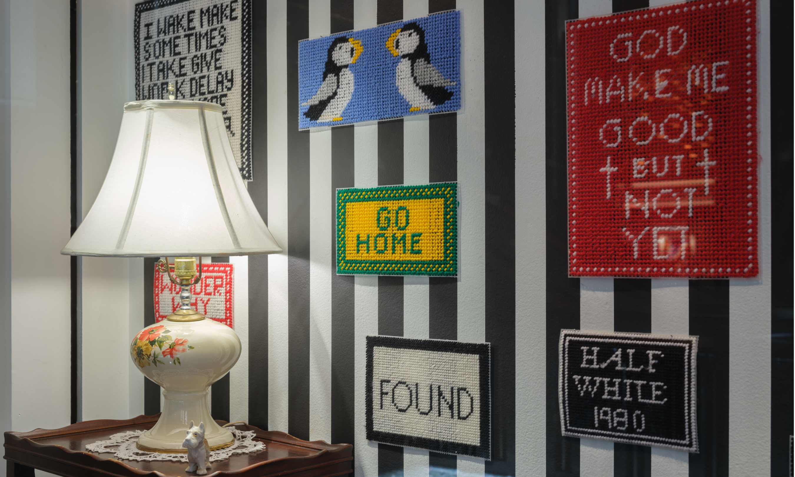 A collection of embroidered pieces on display as part of artist Shantell Martin's Art in Focus exhibit at Rockefeller Center