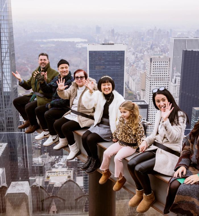 Group of people on The Beam at Top of the Rock