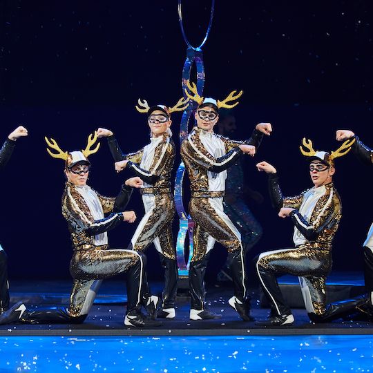 Cirque du Soleil company members perform 'Twas the Night Before in reindeer costumes