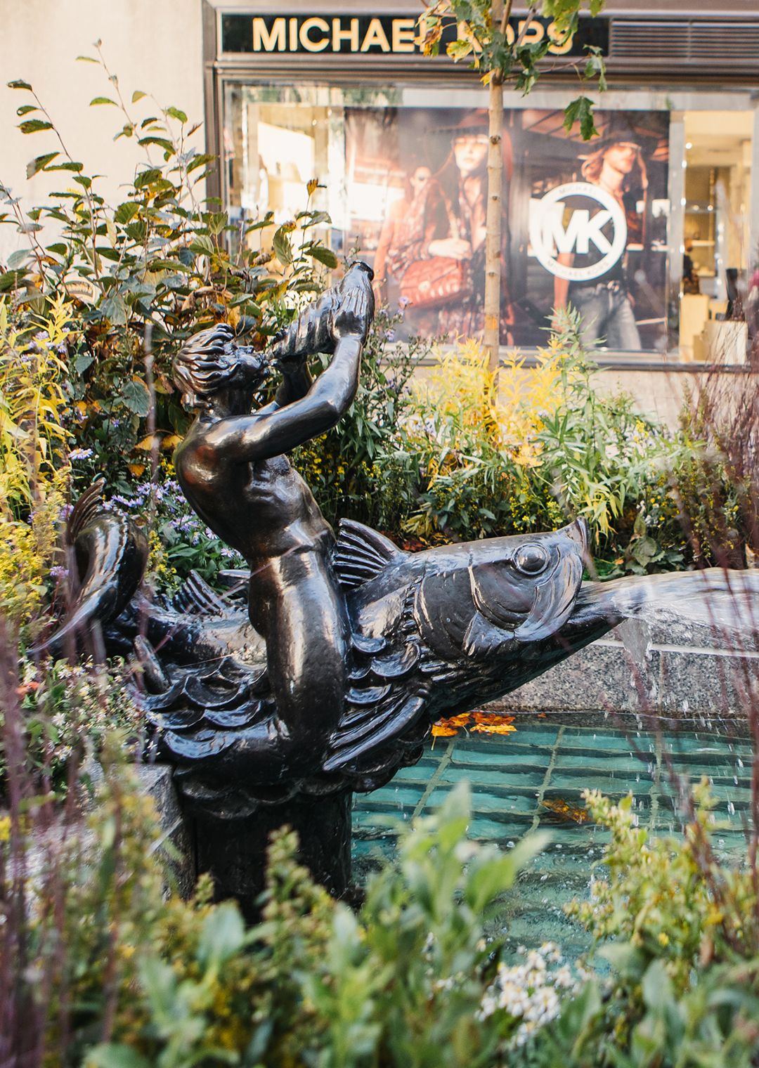 Fountainhead Figures sculptures by Rene Paul Chambellan on display at the east ends of the Six Pools in the Channel Gardens.