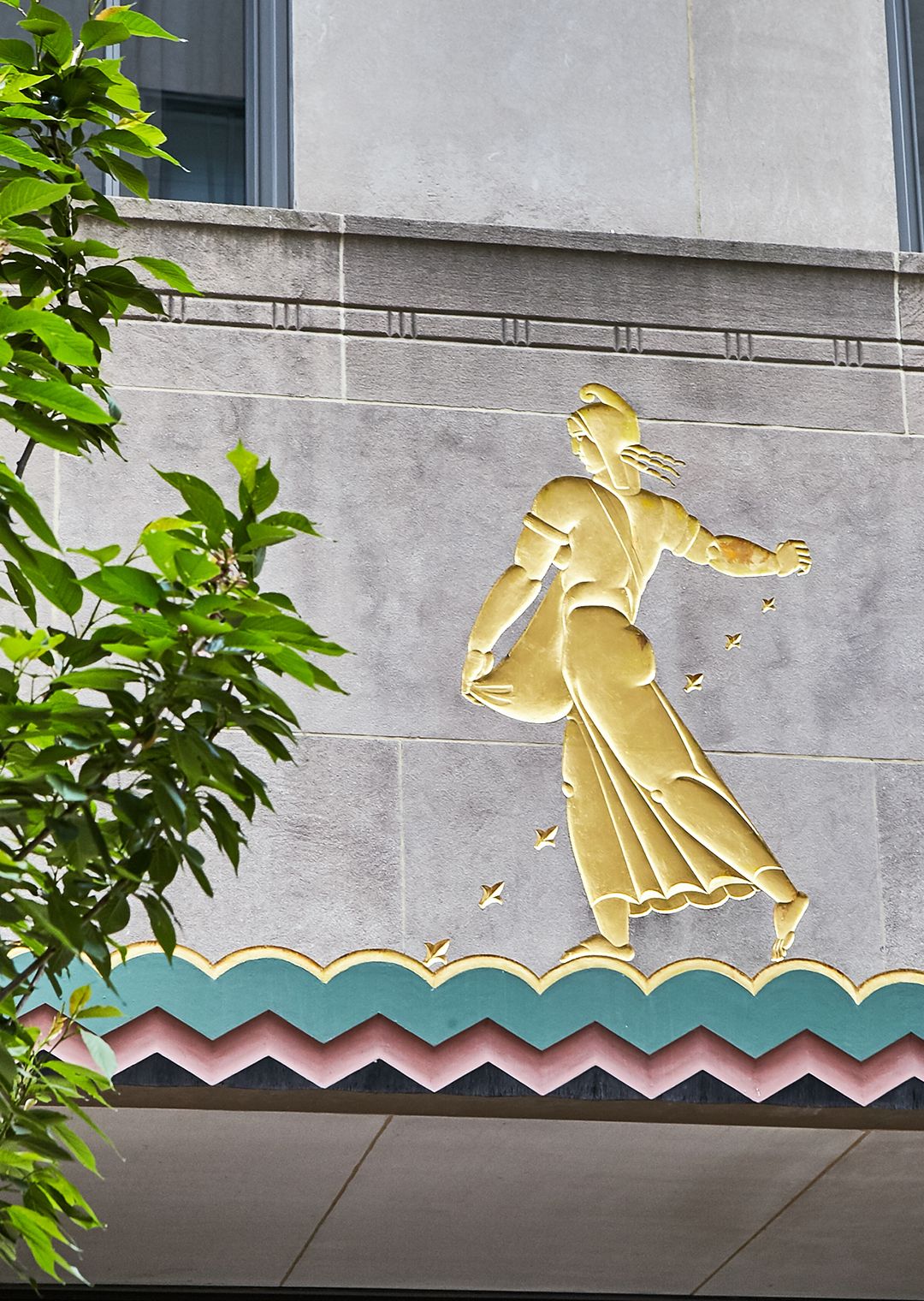 Seeds of Good Citizenship panel sculpture by Lee Lawrie, above Channel Gardens entrance of La Maison Francaise.