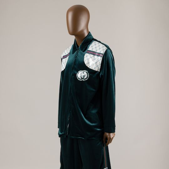 Gucci tracksuit on display at the Fashion Institute of Technology