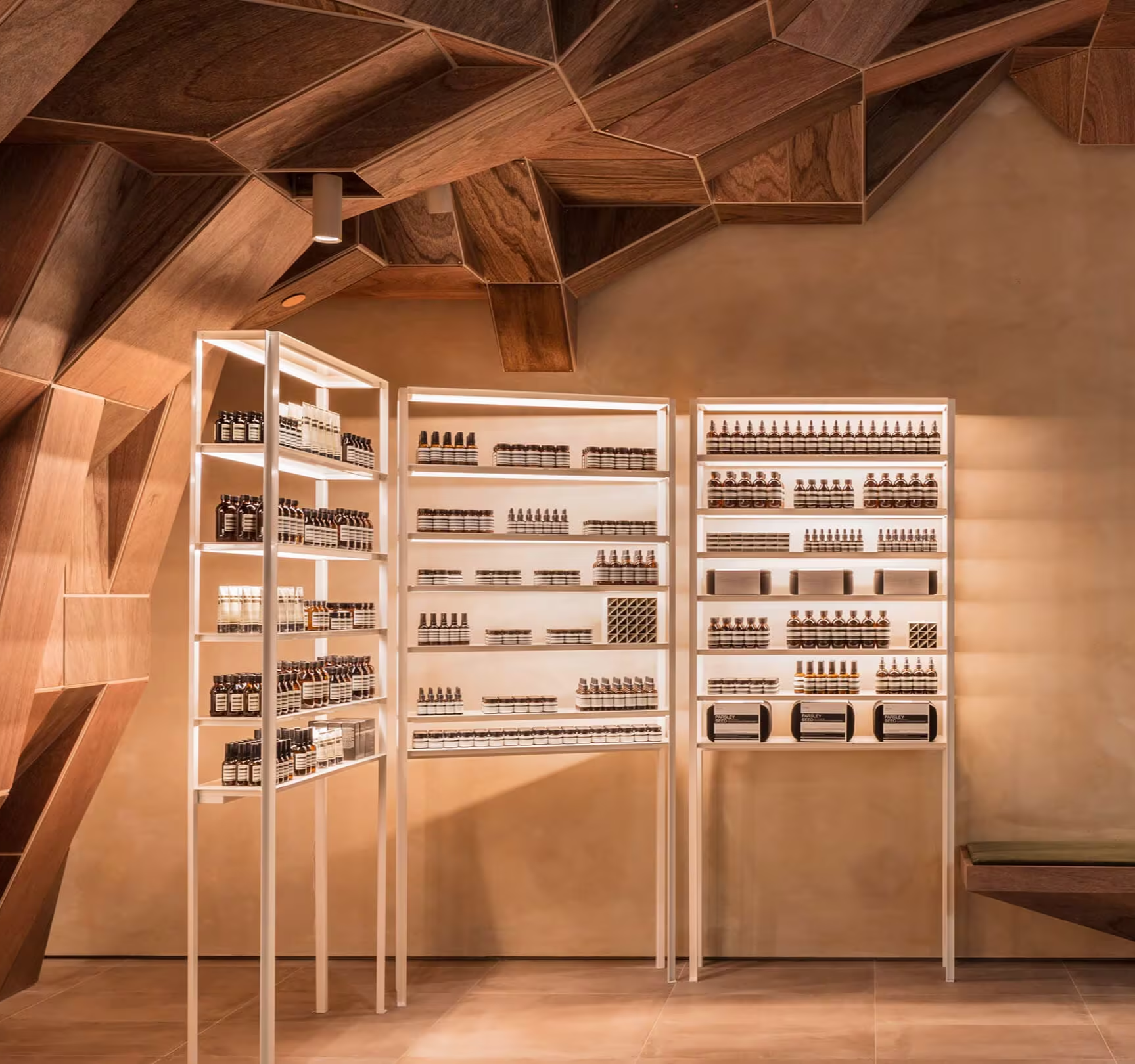 Shelves with Aesop products on display