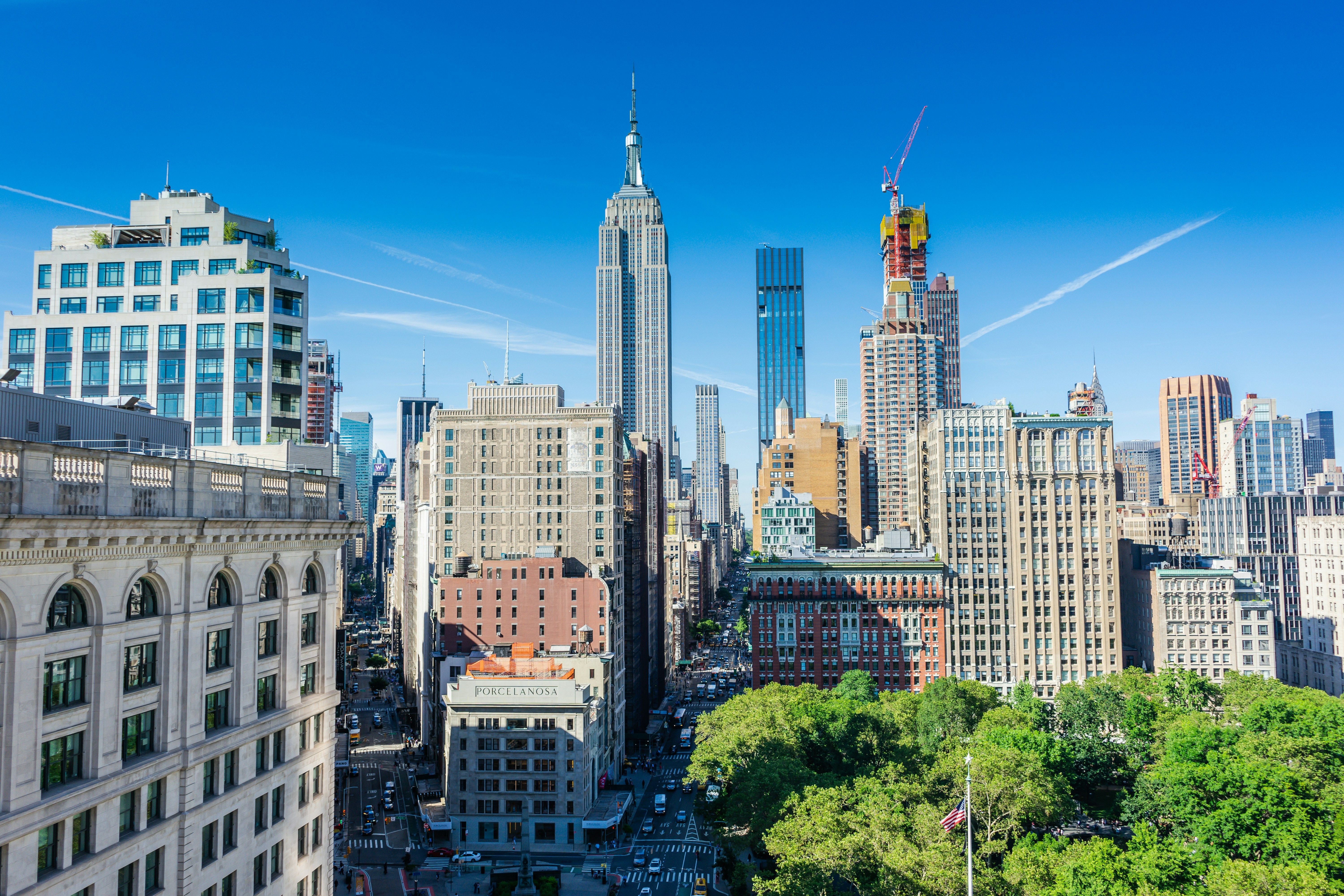 View over the Midtown Manhattan skyline on a clear summer day.