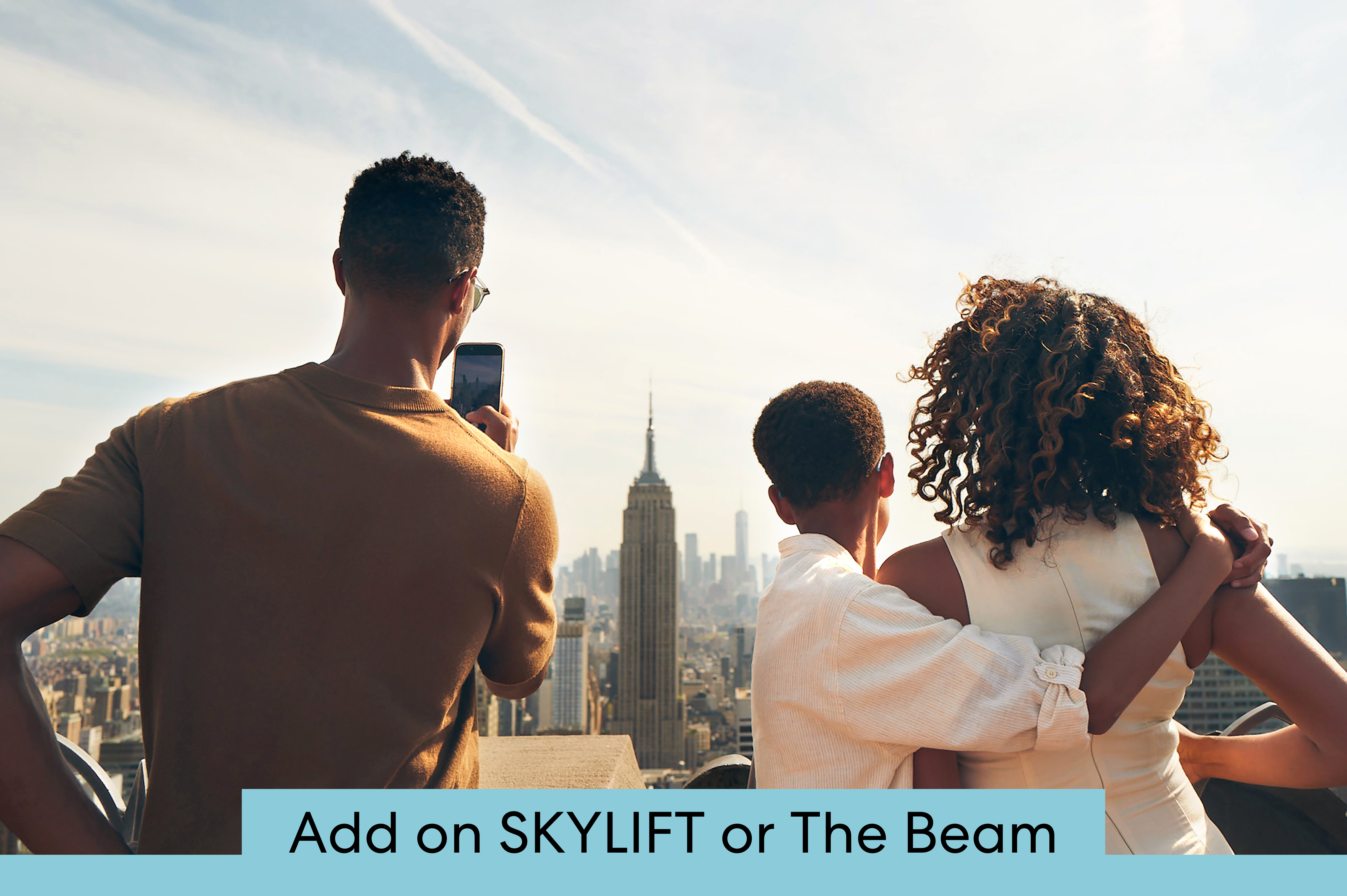A family looking at the new york city skyline.