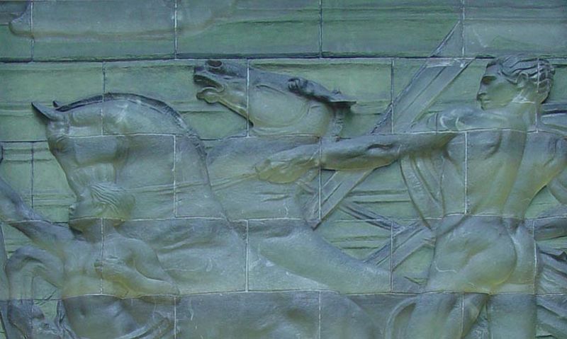 Youth Leading Industry, a carving by Attilio Piccirilli on display above the main entrance of 636 Fifth Avenue.