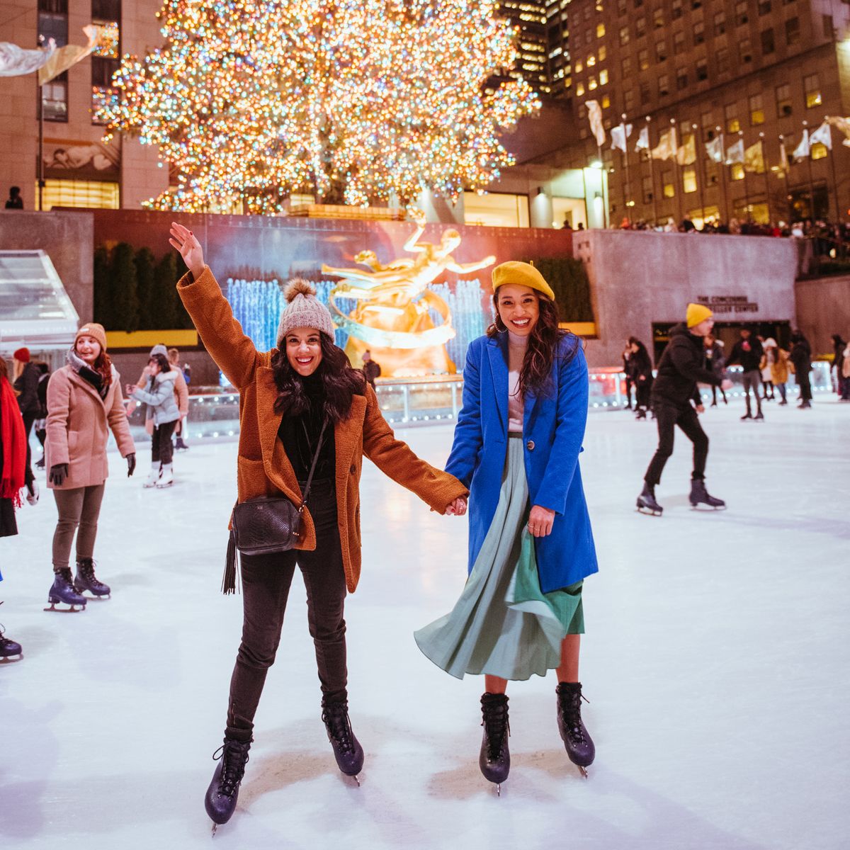 Ice skating at the Rock Center rink as a NYC winter tradition.