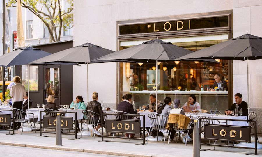 People sitting at tables on Lodi's outdoor patio