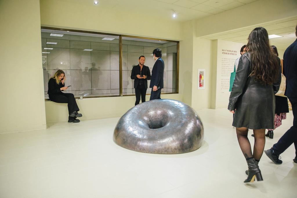 Silver floor sculpture featured in MASA's exhibition at Rockefeller Center