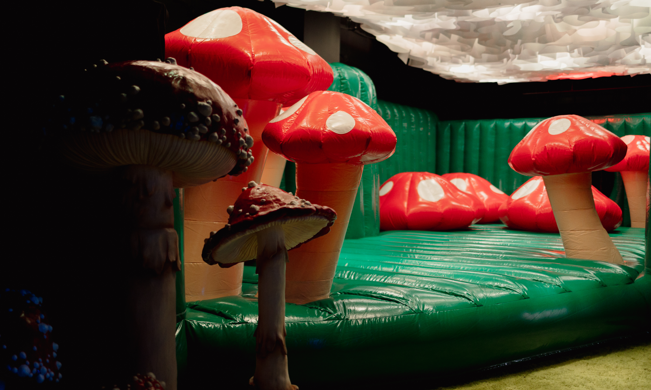 Mushroom bounce house inside BLOOM at Rockefeller Center