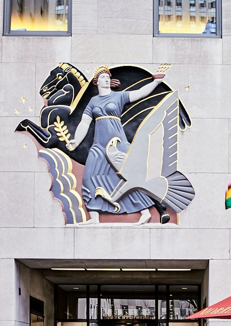 Progress, a bas-relief sculpture by Lee Lawrie, on display above 49th Street entrance at Rockefeller Center.