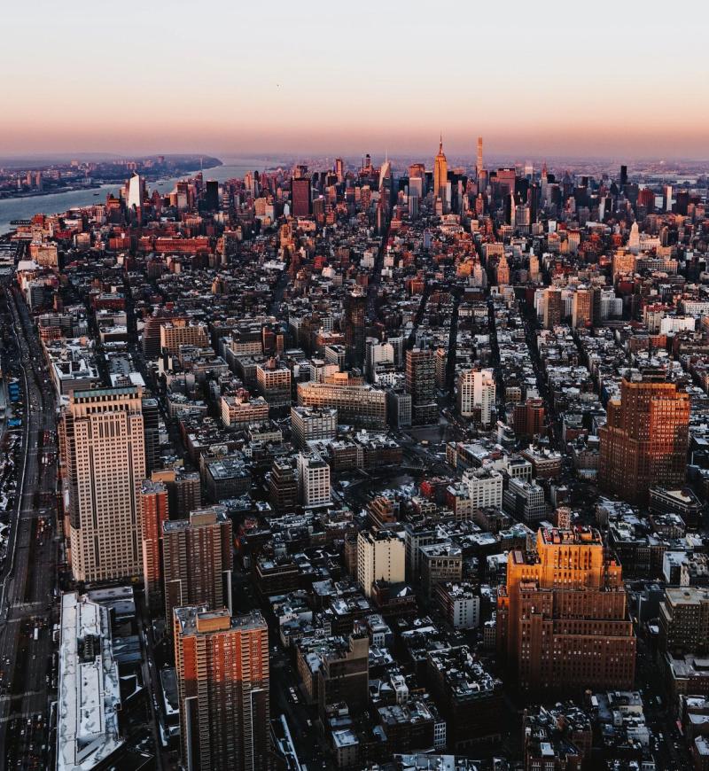 Aerial view of New York City at sunset by Joshua Newton