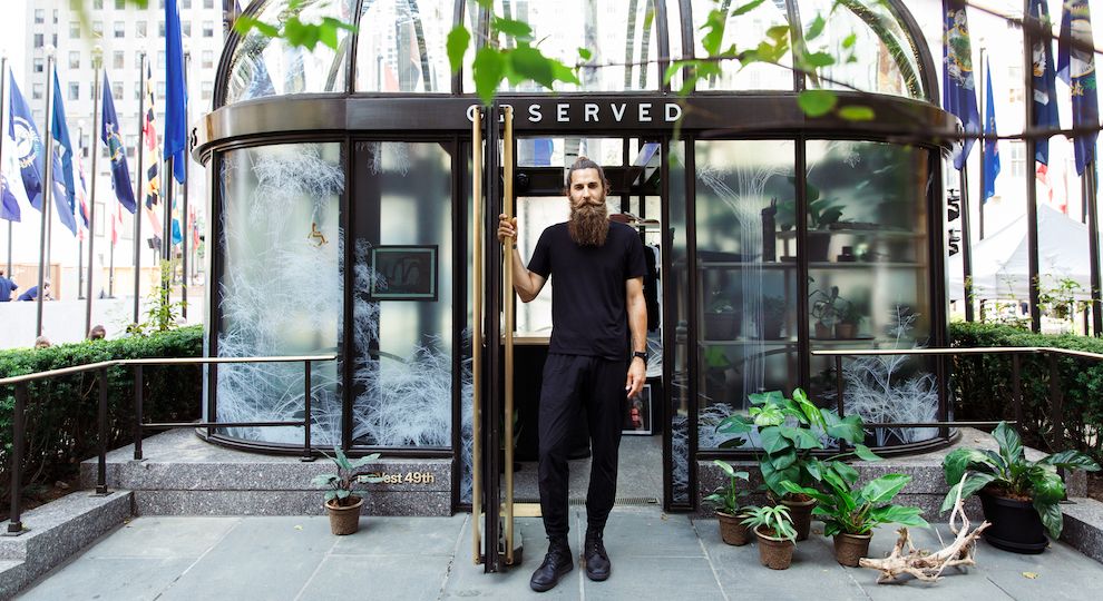 Founder Philip Kayden outside of the OBSERVED pop-up shop at Rockefeller Center