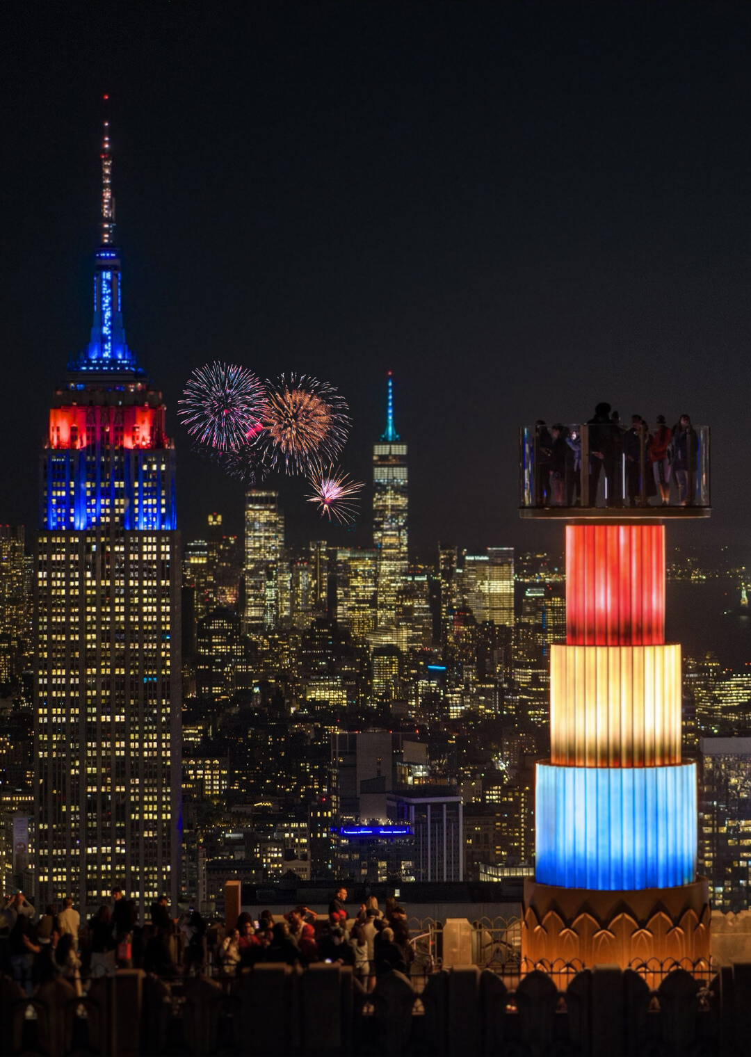 Fireworks and skyline view with red white and blue