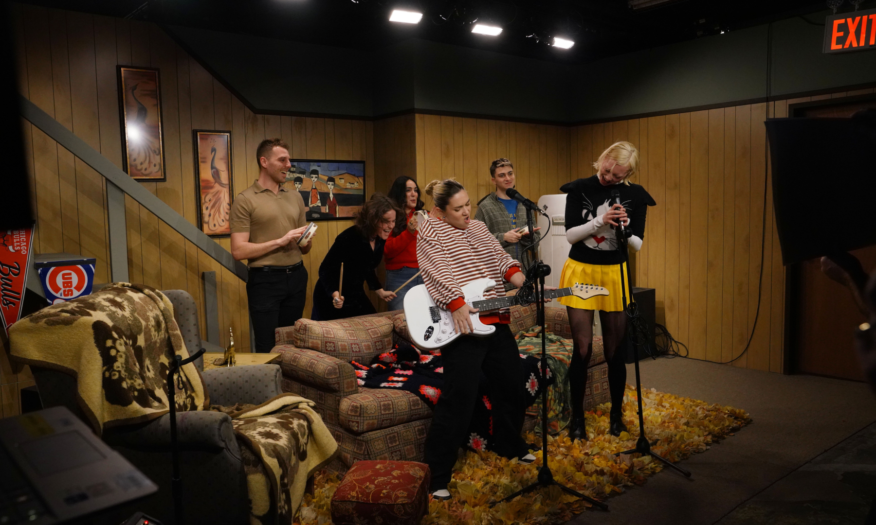 Group of people reenacting a Saturday Night Live sketch at the 'Live from New York: The SNL50 Experience'