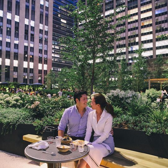Couple eating a meal on the rooftop of Radio Park