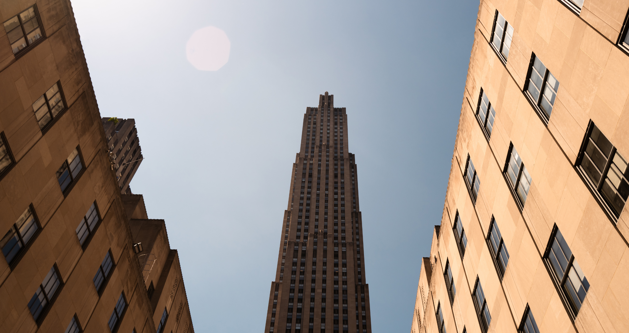 rockefeller center buildings with blue sky