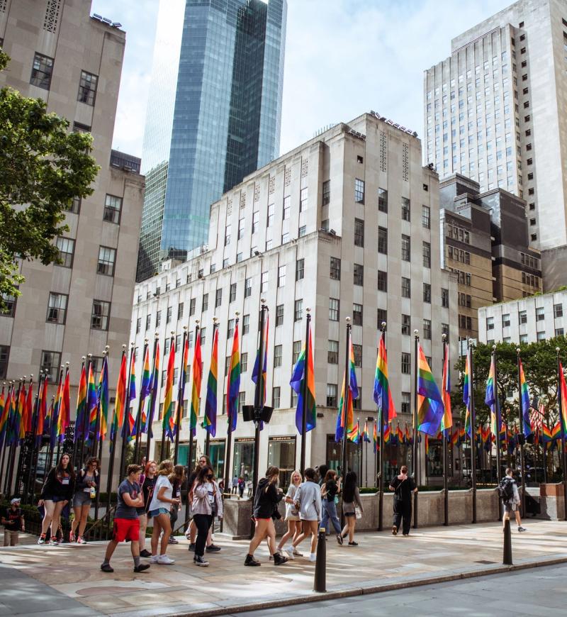 Pride flags around The Rink at Rockefeller Center
