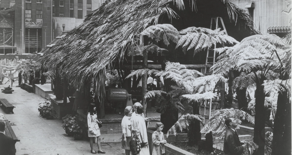 A Hawaiian Garden features hales, tikis, tree ferns, feather kahilis, and more in the Channel Gardens