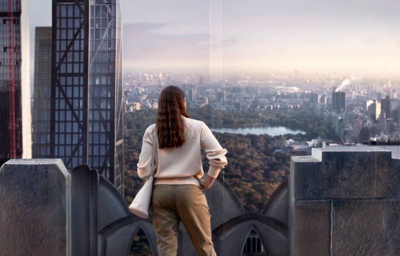 Woman overlooking skyline 