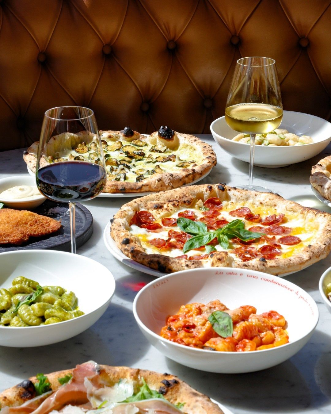 pizza and italian food on a table