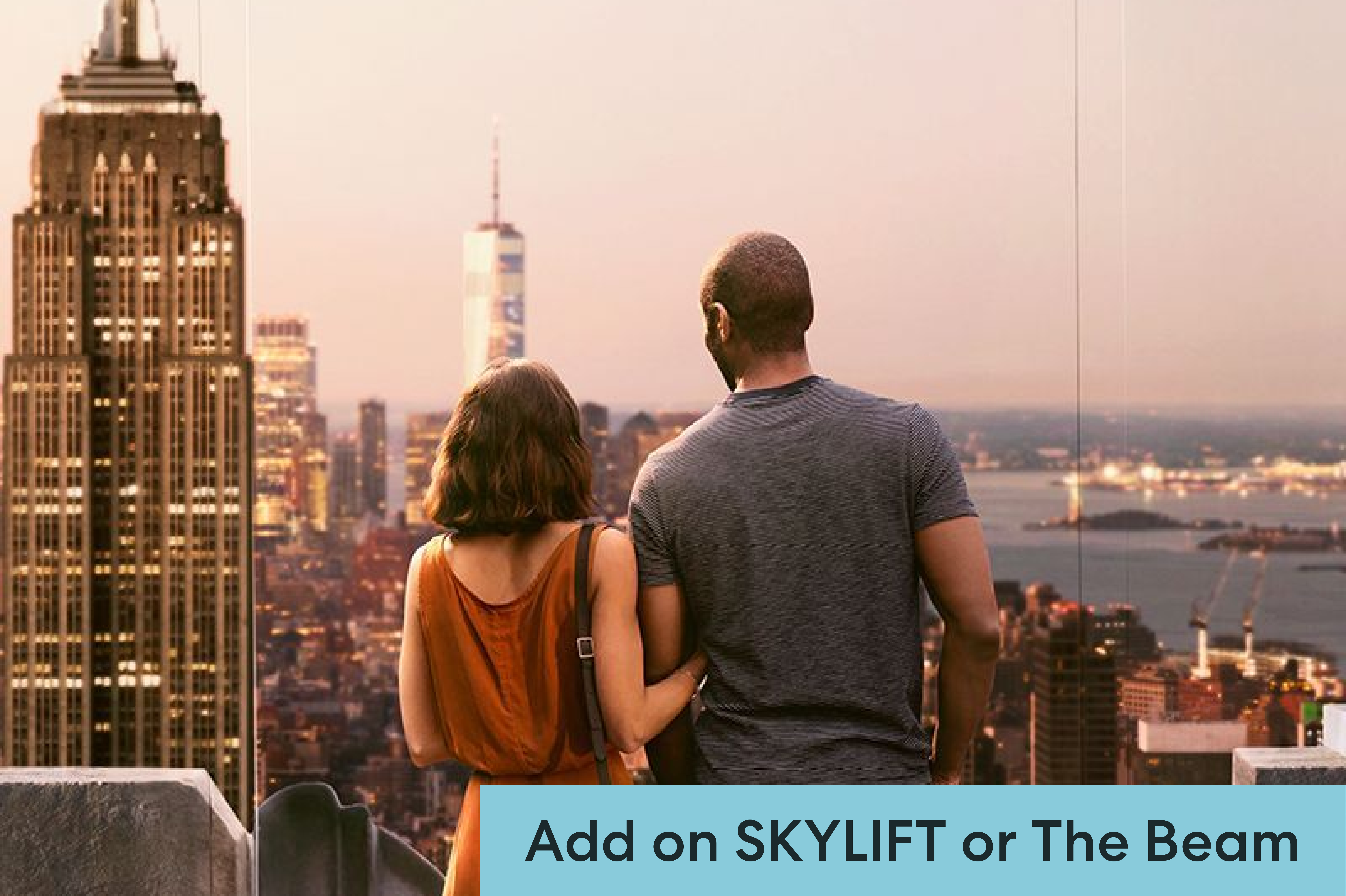 A couple embraces each other while watching a romantic sunset from Top of the Rock.